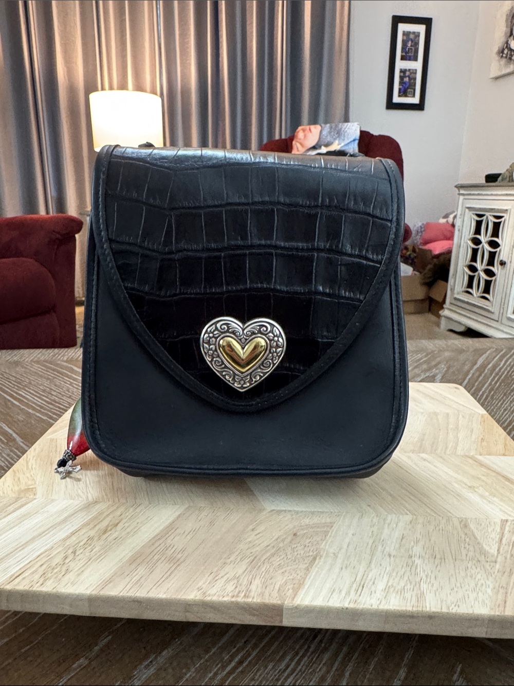 Vintage black Brighton leather crossbody bag featuring a croc-embossed flap